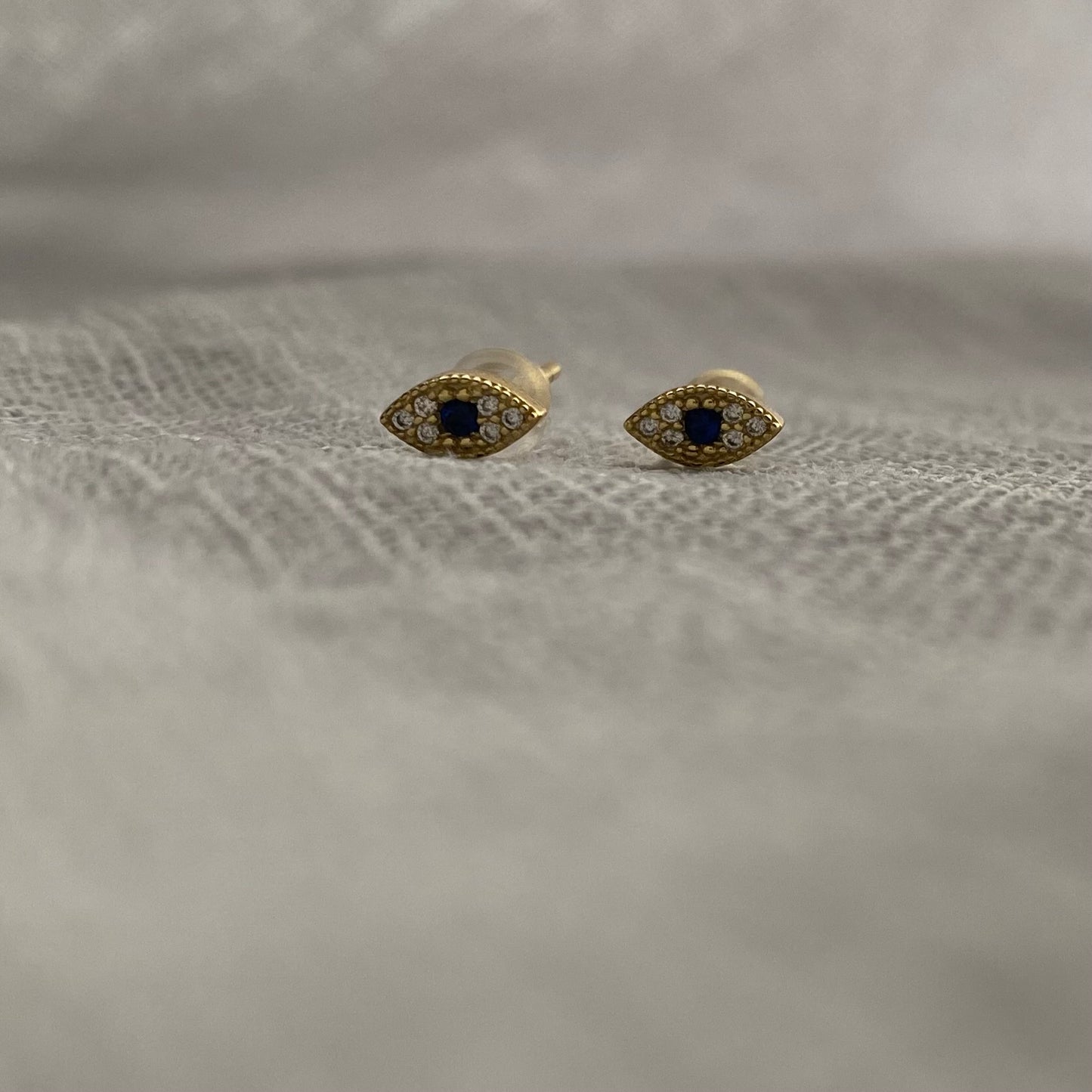 Gold evil eye